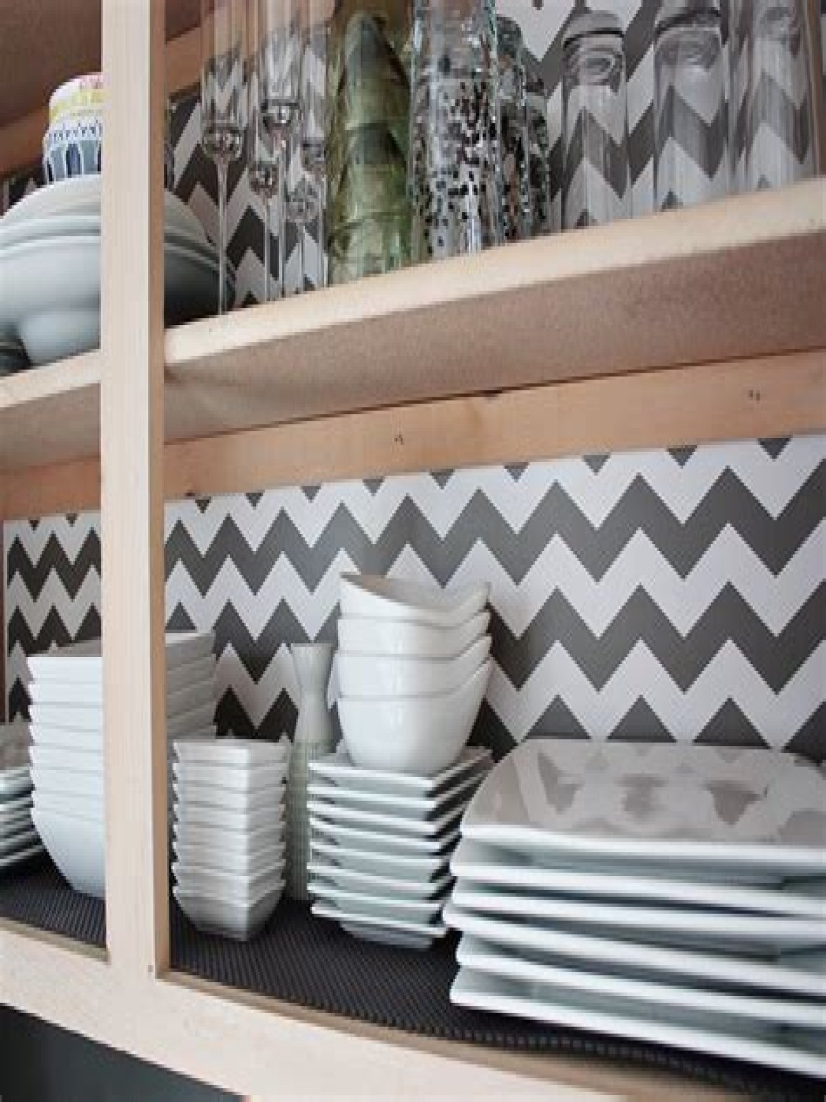 How do you line shelves with contact paper?