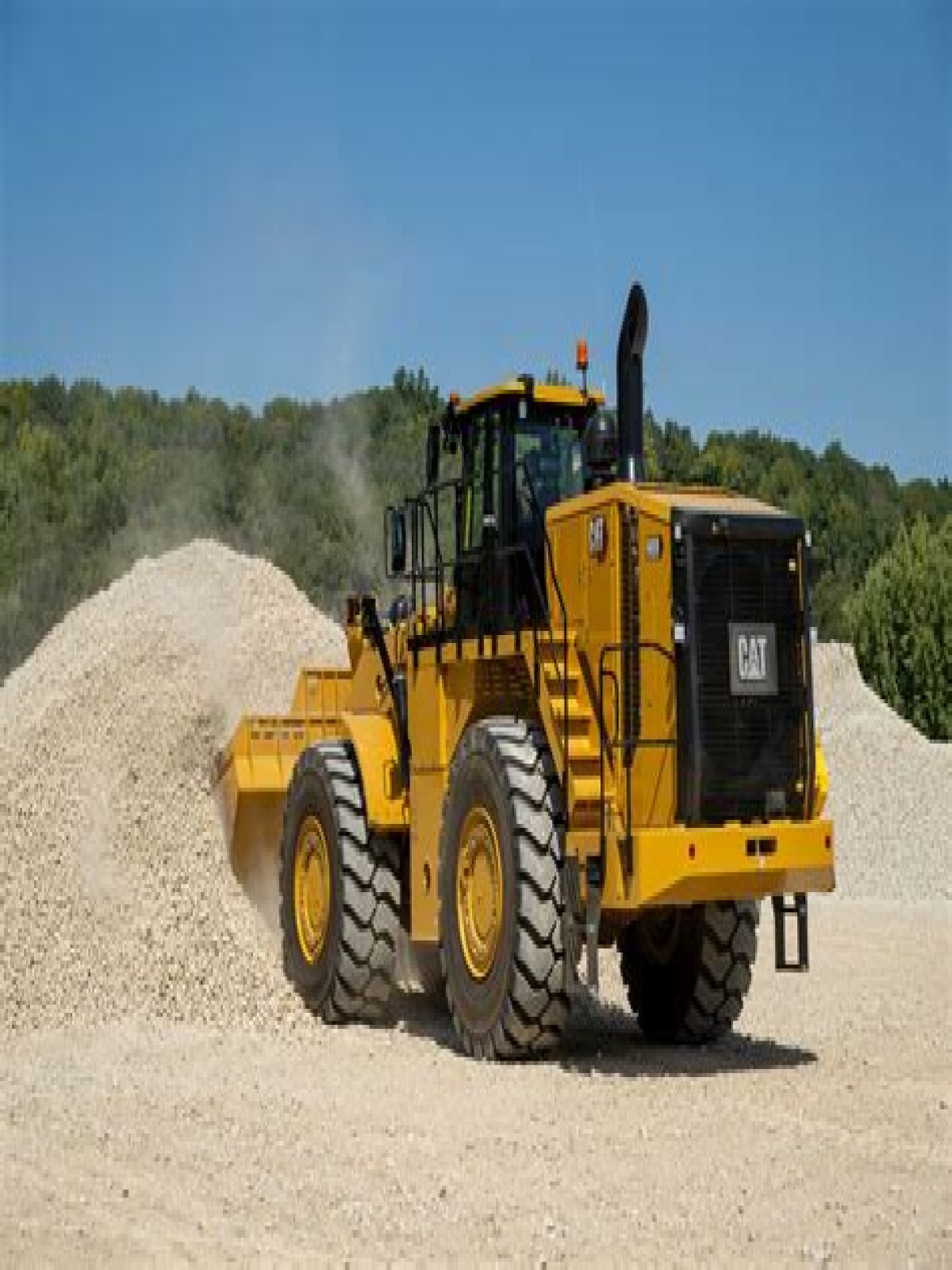What is the weight of a 988 CAT loader?